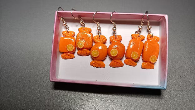 La paire de boucle d'oreille Bonbon orange